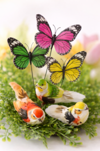 butterfly and bird decoration on display at clayton florist