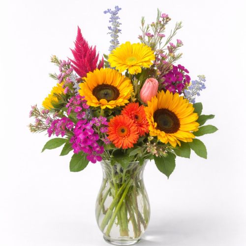 The Garden Stroll Vase features a vibrant mix of sunflowers, pink and purple blooms, orange gerbera daisies, and lush greenery—expertly arranged for fresh flower delivery in Clayton NC by Clayton NC Florist.