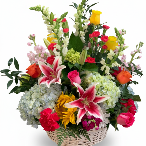 The Garden Celebration Basket from The Florist at Plantation features pink lilies, roses, hydrangeas, sunflowers, and greenery—expertly arranged by your trusted Clayton florist. Perfect for Flower Delivery in Clayton NC.