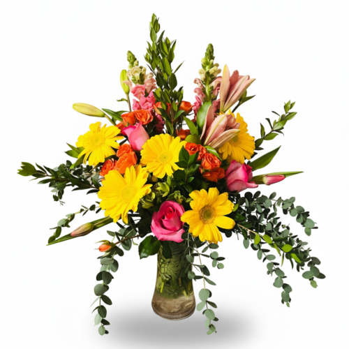 A Bright Day from The Florist at Plantation features yellow daisies, pink roses, lilies, snapdragons, and green foliage—perfect for flower delivery in Clayton NC against a crisp white background.
