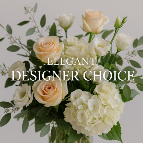 The Florist at Plantation presents "Elegant Designer's Choice," a stunning floral arrangement with peach roses, white hydrangeas, and greenery. Perfect for flower delivery in Clayton, NC.