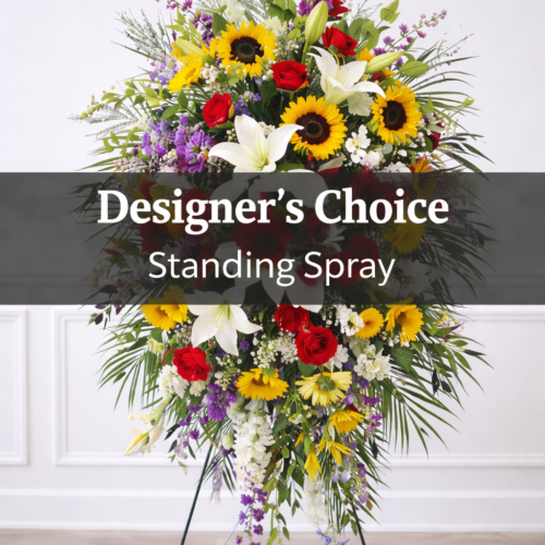 Standing Spray - Designer Choice: A striking arrangement of mixed flowers and greenery on a black stand, expertly crafted by The Florist at Plantation—your trusted Clayton NC florist.
