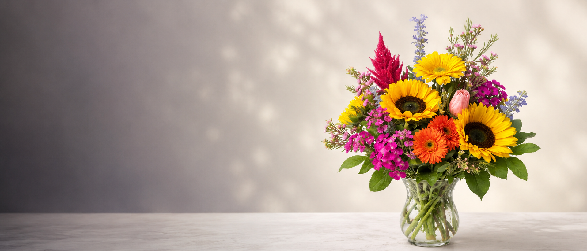 Bright summer sunflower arrangement by Clayton Florist in Clayton NC